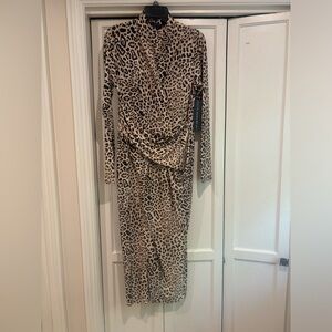 Rachel Roy Animal print long sleeve dress with V neck.